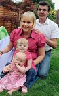 Joy and heartbreak: Dave and Donna with their precious girls Katie and baby Jessica 